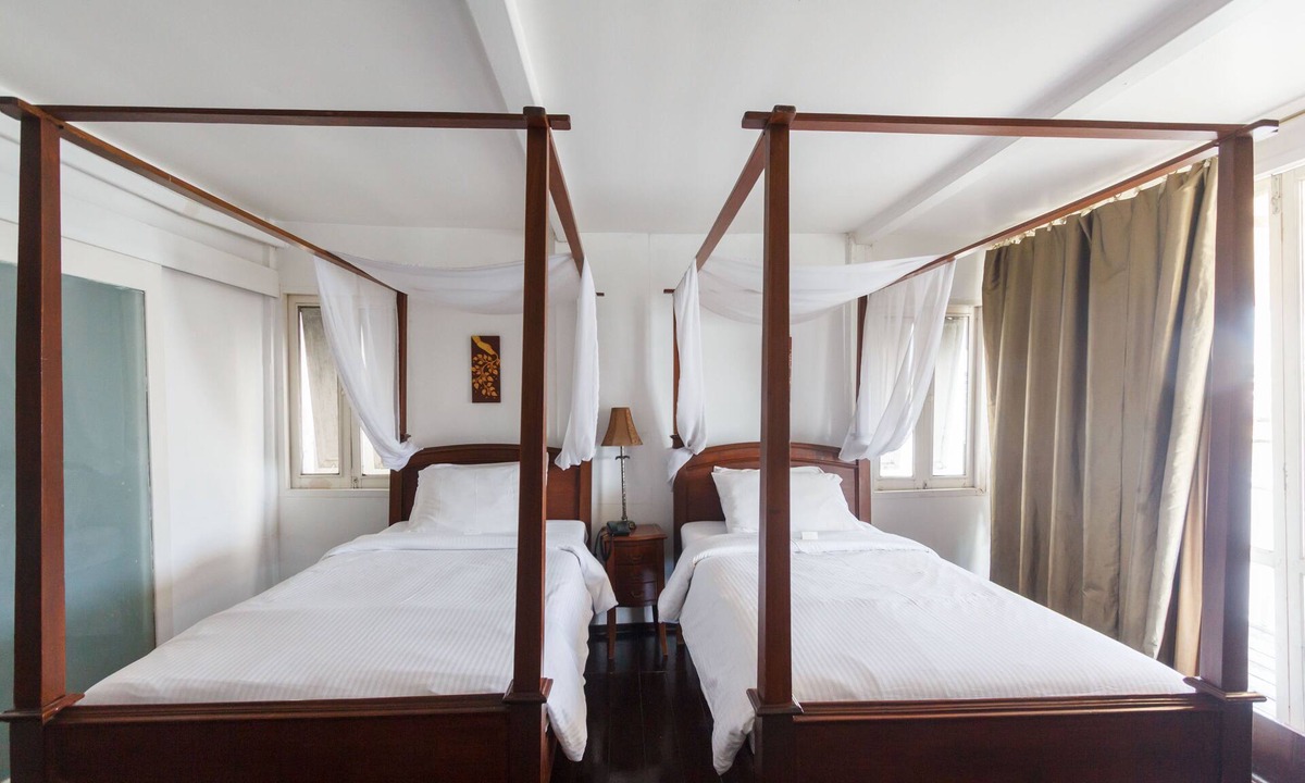 Siriraj Bed & Breakfast | Quiet stay by the river, twin bed with private balcony