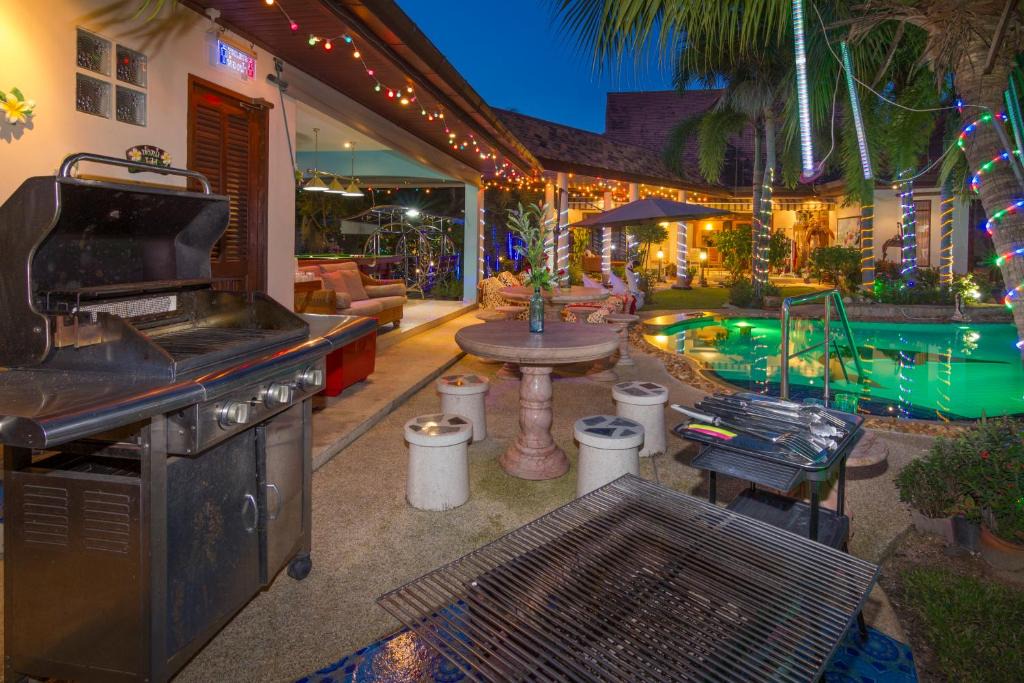 Nong Pla Lai Villa | Relaxing Palm Pool Villa and Tropical Garden