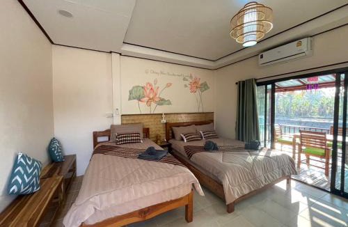 Chiang Khan Hotel | เชียงคานพาราไดร์รีสอร์ท&มีตติ้ง