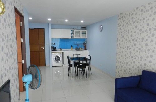 Jomtien Apartment | Apartment bedroom + living room.