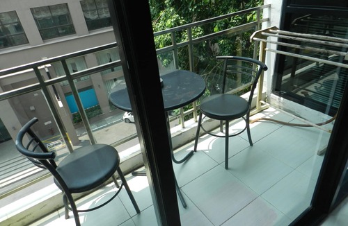 Jomtien Apartment | Apartment bedroom + living room.