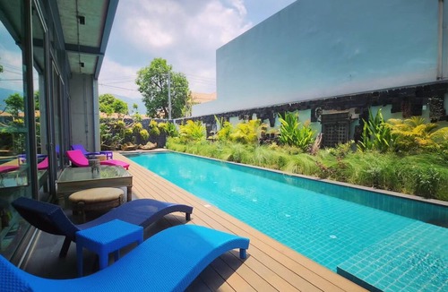 Huay Kaew Villa | Cozy loft-style rooms, private baths, free Wi-Fi, A/C, and shared spaces.