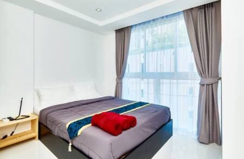 North Pattaya Condo | Featuring an outdoor pool
