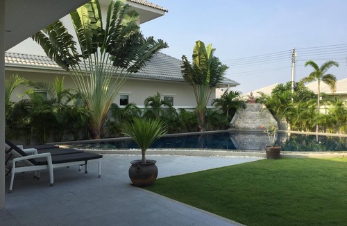 Ban Nong Sadao Villa | Modern luxury villa with large saltwater pool, jacuzzi and tropical garden