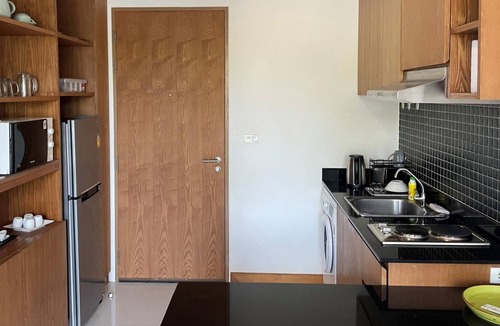 Ban Saiyuan Apartment | Peaceful Condo in Rawai, poolside apartment