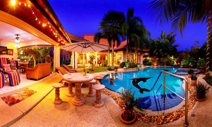 Nong Pla Lai Villa | Relaxing Palm Pool Villa, & Tropical Illuminated Garden & Private Swimming Pool.