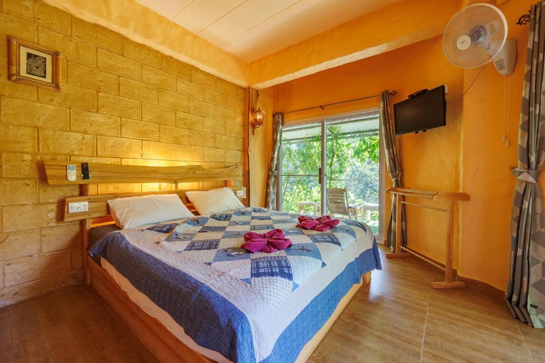 Photo of Bedroom in Ban Ta Khun