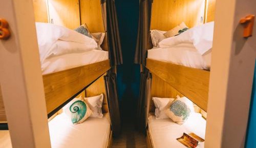 Bed in 4-Bed Female Dormitory Room with Shared Bathroom